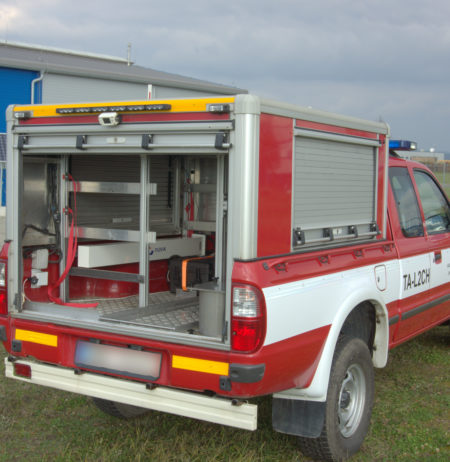 A vehicle with a radiation monitoring system fixed inside of it