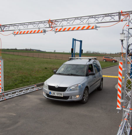 A radiation portal monitoring system for vehicles installed on a road