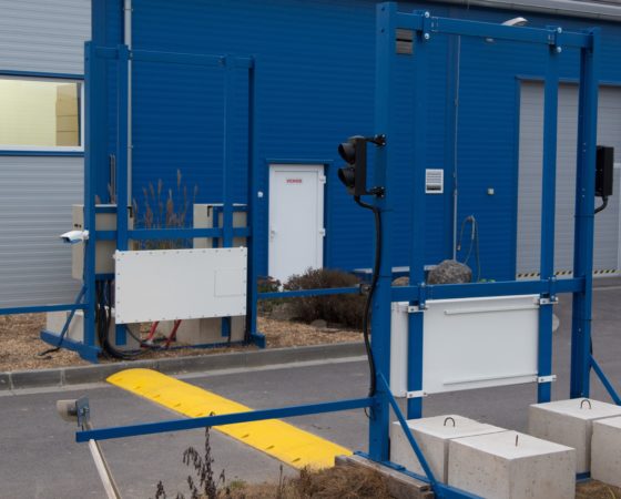 A radiation portal monitoring system for vehicles installed on a road