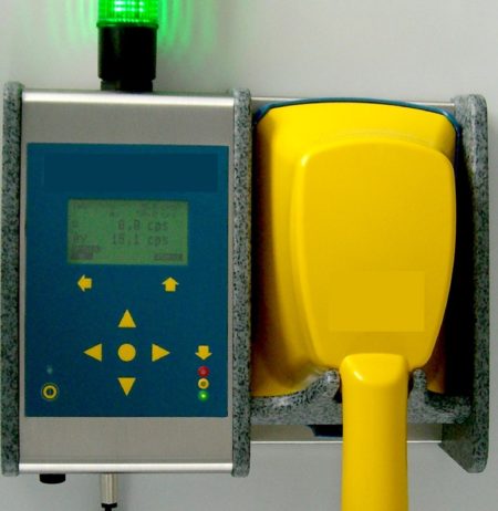 A stationary contamination monitor