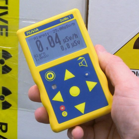 dose and dose rate monitor held into a hand