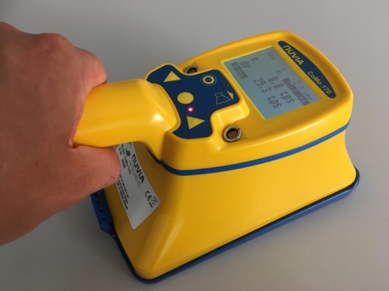 A hand-held contamination monitor