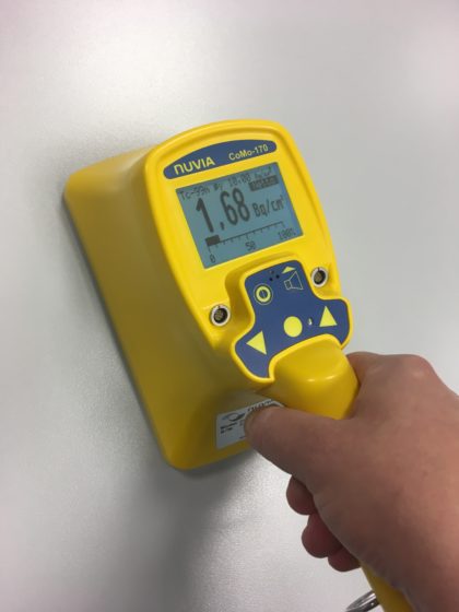 A hand-held contamination monitor