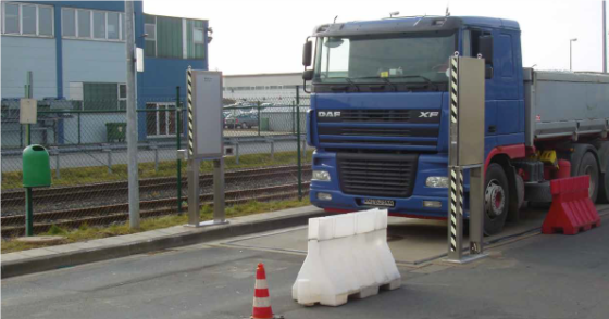 A truck crossing a radioactivity monitor on a road