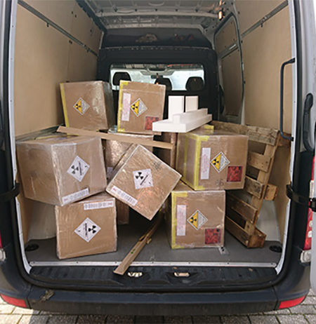 Boxes of radioactive products in a vehicle