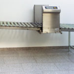 A roller conveyor radioactivity measurement system